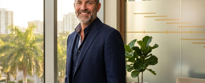 Confident man in modern clinic setting representing a decade of consistent hair restoration patient testimonials and results