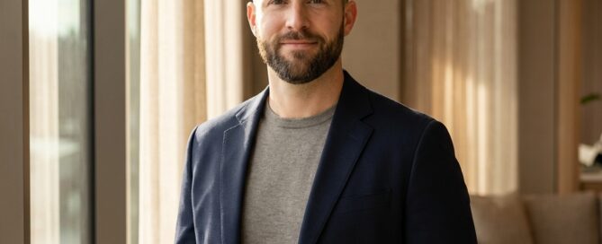 Confident man with close-cropped hair in modern clinic — scalp micropigmentation what is it explained