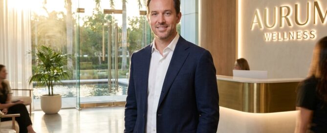Confident man in a modern Florida medical office representing the best hair transplant results in Florida