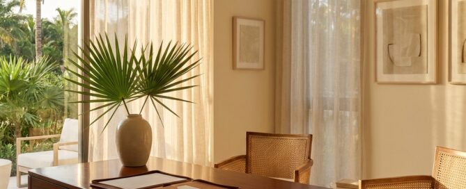 Elegant boutique hair restoration clinic South Florida consultation room with warm natural light and sophisticated decor