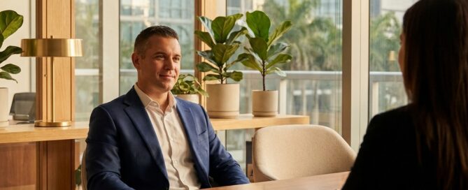 Man preparing for a hair transplant surgeon consultation at a modern Miami Florida medical office